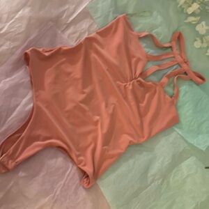 very gently worn rosy pink size small Iris body suit